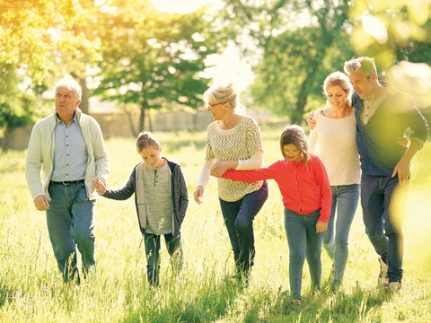 Happy family of 6 walking in park Happy family of 6 walking in park